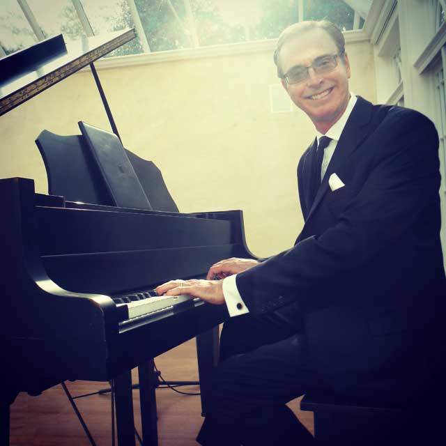 Pianist Kevin Fox performing for a private event in Montecito, California on May 4, 2018.